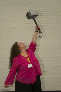 Margaret holding Thor's hammer. 